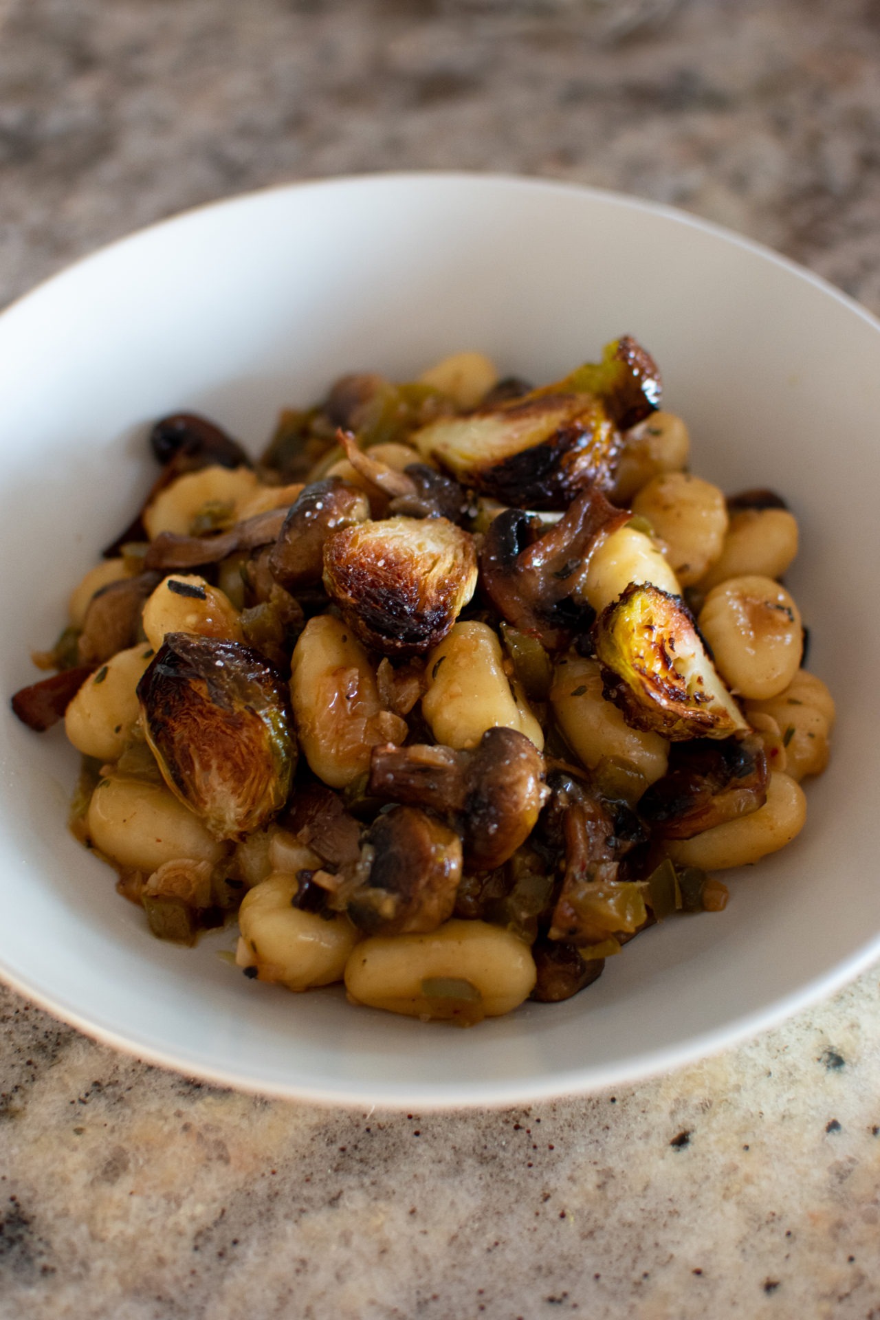 Vegetarian Gnocchi with mushrooms brussel sprouts