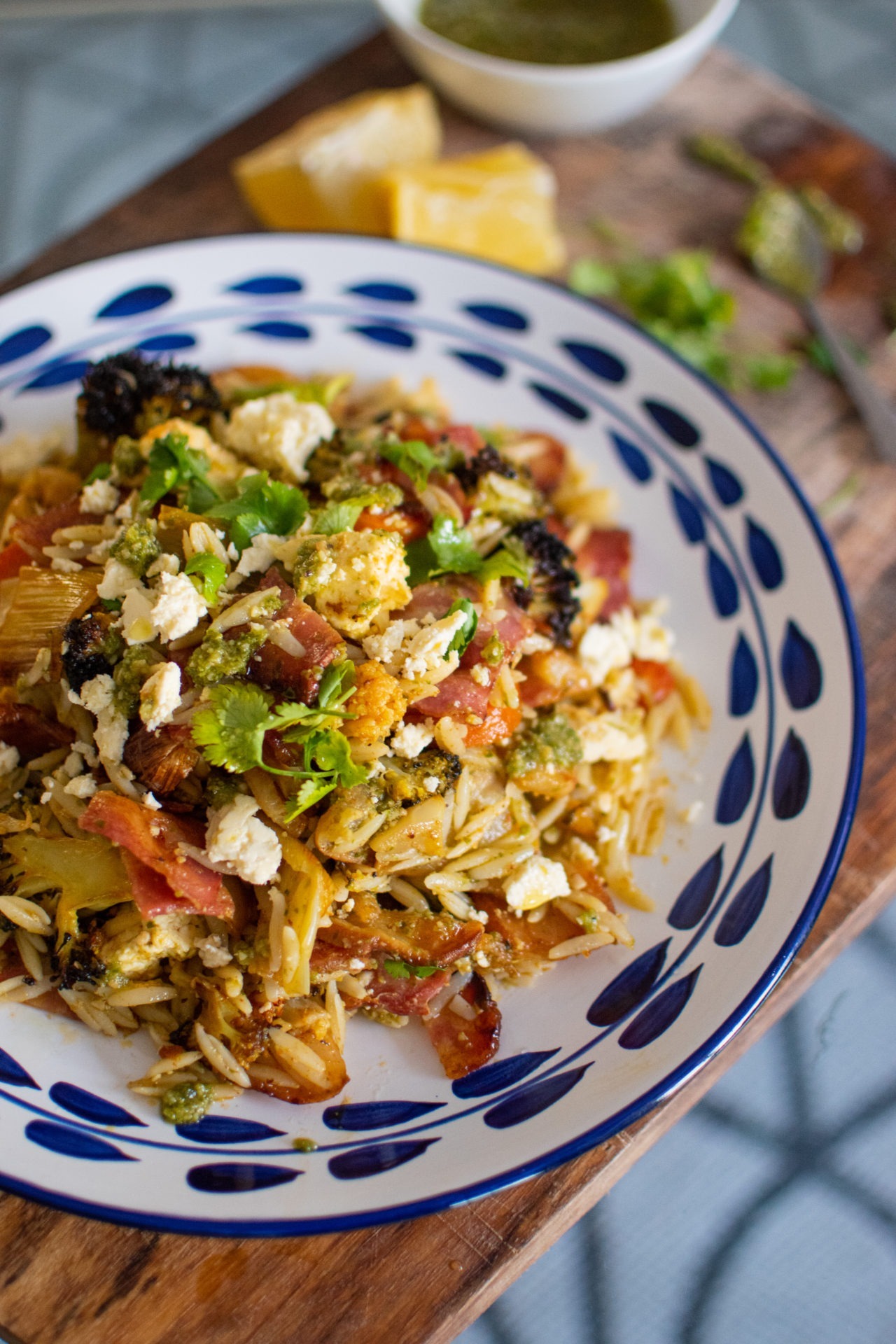 Orzo Pasta with bacon roast vegetables avocado feta basil pesto