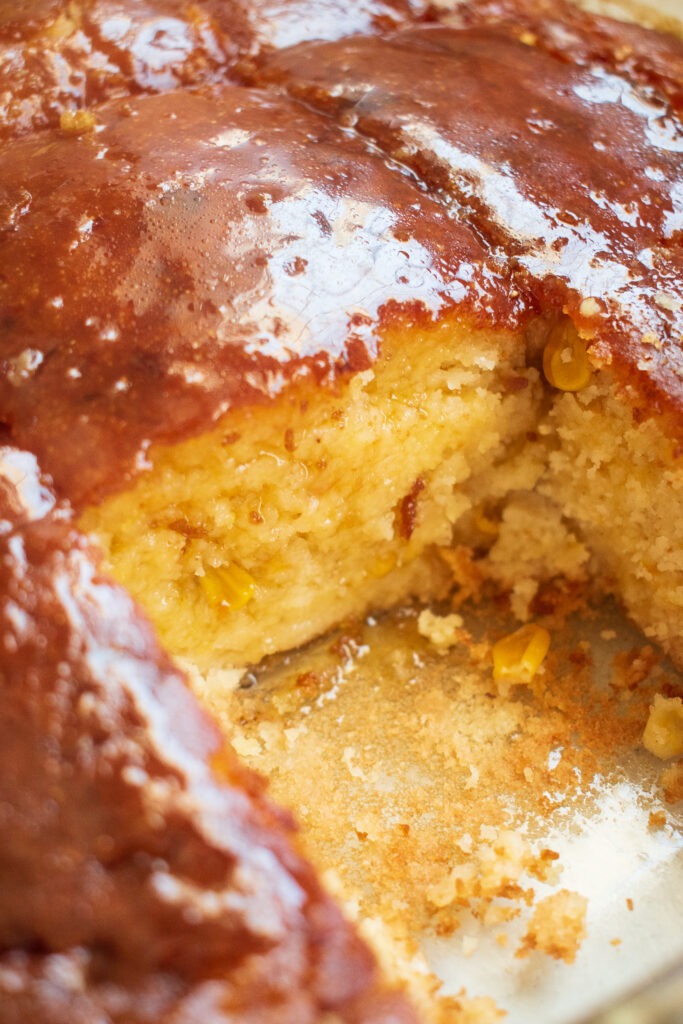 South African-style cornbread, also known locally as "mealie bread", is a hearty and flavorful dish made from maize (corn) meal, which is a staple in South African cuisine. It's slightly different from the American cornbread as it often incorporates fresh corn kernels, giving it a moist and slightly chunky texture.